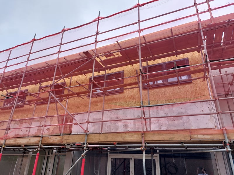Windows have been installed and new businesses are starting to open in Wellington Way units.
