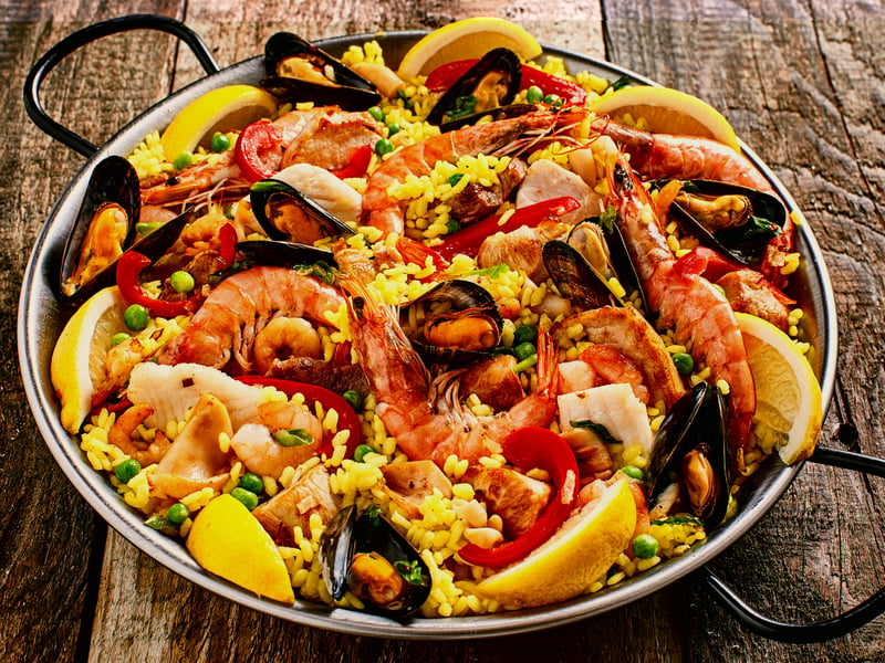 The traditional Spanish dish which is made of rice, saffron, as well as chicken or seafood has been voted the best-loved holiday meal of all time. Paella originates from the region of Valencia, and takes its name from the pan it is made in. (Photo: exclusive-design - stock.adobe.c)