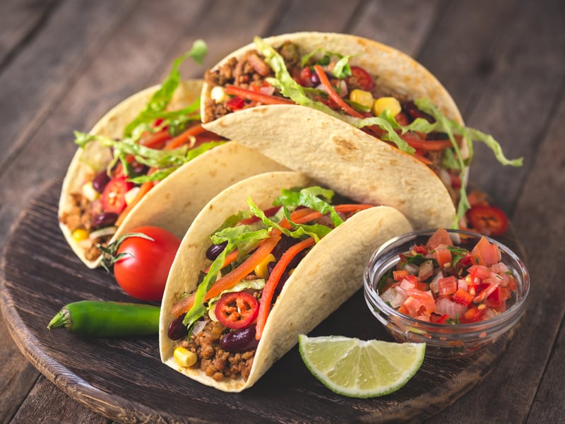 Tacos, which hail from Mexico came in second place on the list. The dish, which is eaten by hand, is made up of a corn or wheat tortilla, which is topped with various fillings. (Photo: pilipphoto - stock.adobe.com)