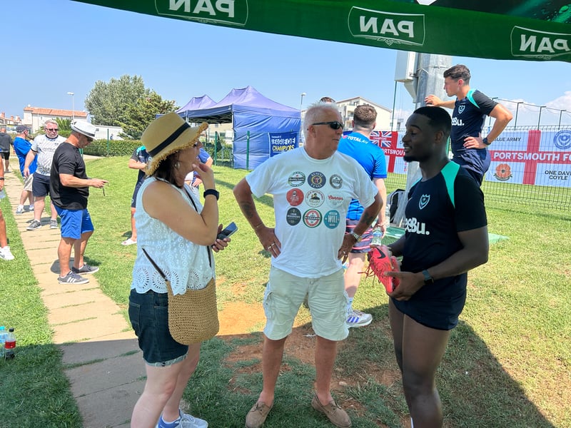Christian Saydee talks to supporters after training