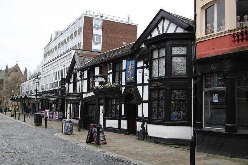 Ye Olde Man & Scythe, located in Bolton is the oldest in its area, with reports of it dating back to 1251. A datestone located inside the pub says that the building of the pub was rebuilt in 1636. Ye Olde Man & Scythe are known for their strong ciders and freshly-baked pastries