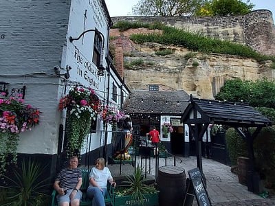 Located in Nottingham, Ye Olde Trip to Jerusalem which is also known as “the Trip”, is reported to have been established in 1189. The pub has an outdoor beer garden, as well as a cosy real fireplace. As well as great beer, Ye Olde Trip To Jerusalem even serve merchandise.