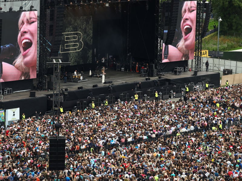 A view over the crowd towards Natasha Bedingfield playing on the main stage.