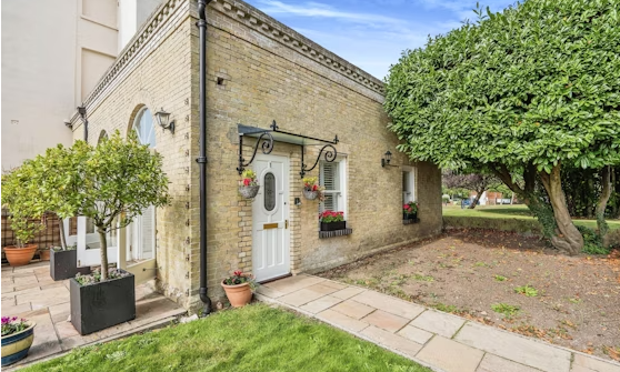 The property listing says: "No 1 is a unique duplex style property, formally the Orangery to this wonderful character building and enviably enjoys its own private entrance and garden area to the front." 