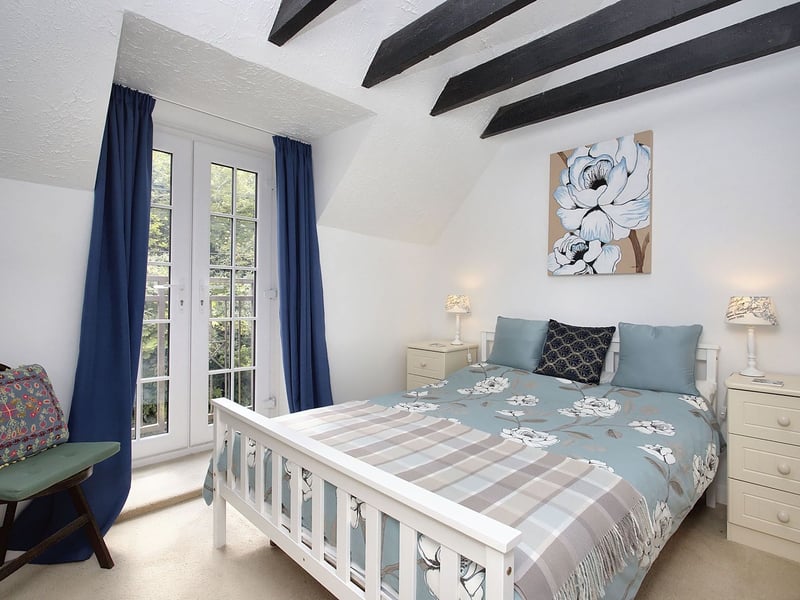 The three bedrooms are on the first floor, connected to a naturally-lit landing that allows extra light into the home. Each bedroom enjoys neutral decoration and fitted carpeting, as well as French doors to a Juliet balcony ensuring an airy ambience.
