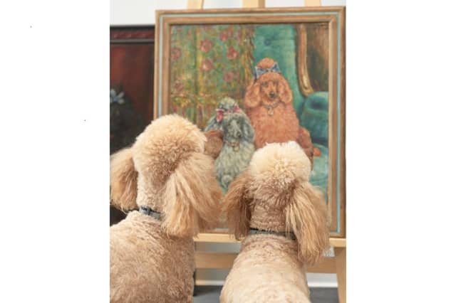 Hudson and Murdo cast their expert eyes over a painting of a pair of poodles by Frederick Thomas Daws.