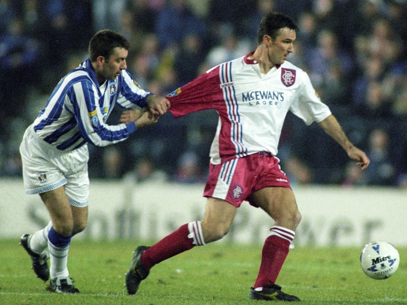 Made famous by the nine-in-a-row team, this is another sought after red and white away number and is valued at around £197 for an excellent condition original.