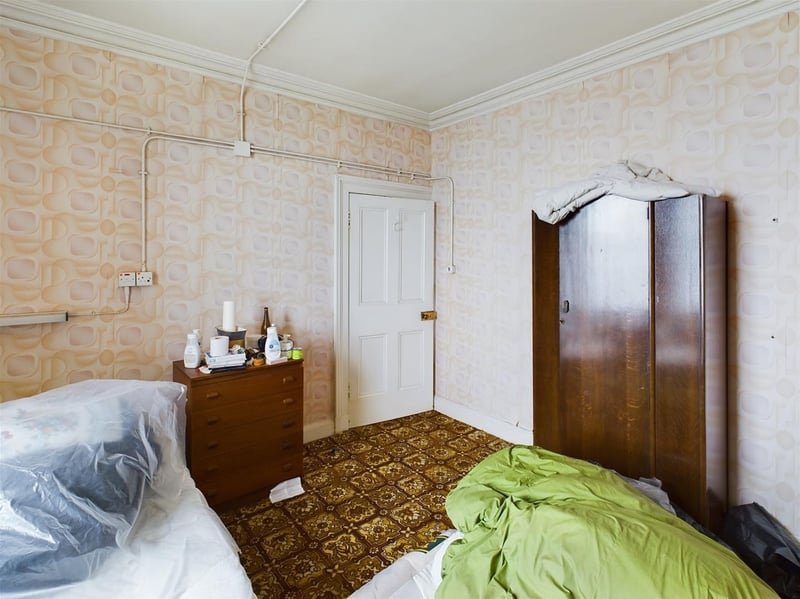 This bedroom enjoys natural light.