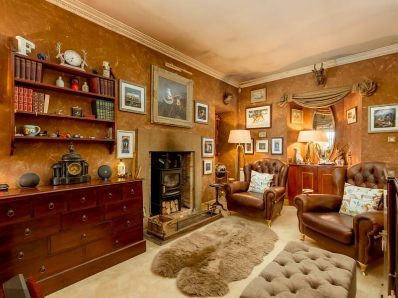 The property boasts electronic gates and a private driveway, as well as substantial garaging, a large garden with greenhouse and a patio. Contact Ellisons