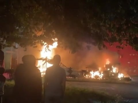 Video footage shows a bus on fire in Harehills