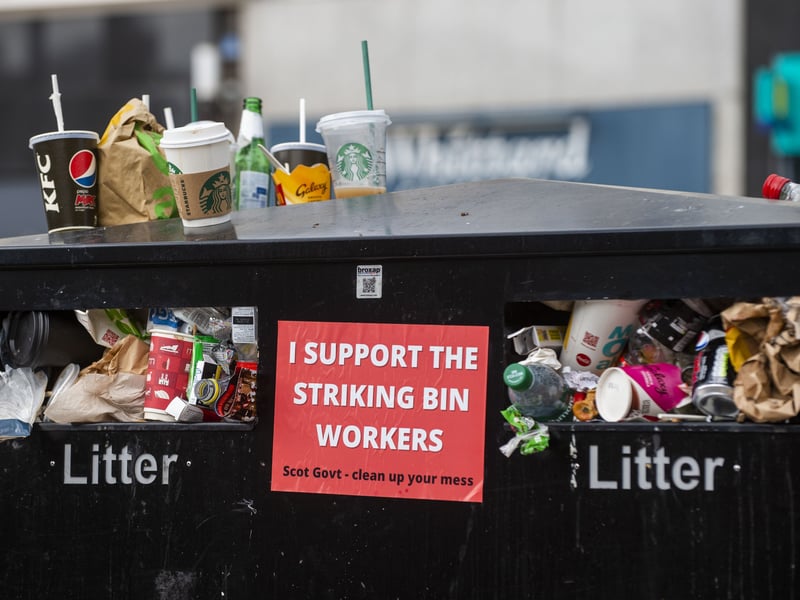 A sticker posted in Edinburgh reads 'I support the striking bin workers. Scot Gov - clean up your mess' in a sign of the feeling amongst local residents