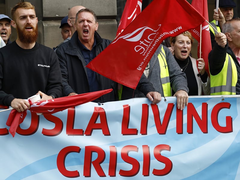 Refuse workers demonstrate outside the City Chambers as discussions between the unions and the council's umbrella body Cosla continue on August 29 in 2022.