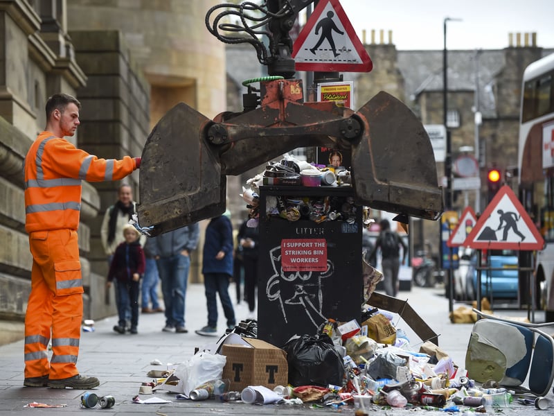 Machinery is used to pick up some of the street rubbish throughout Edinburgh's Old Town