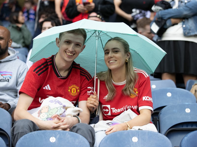 Manchester United fans 'enjoying' the Edinburgh weather.
