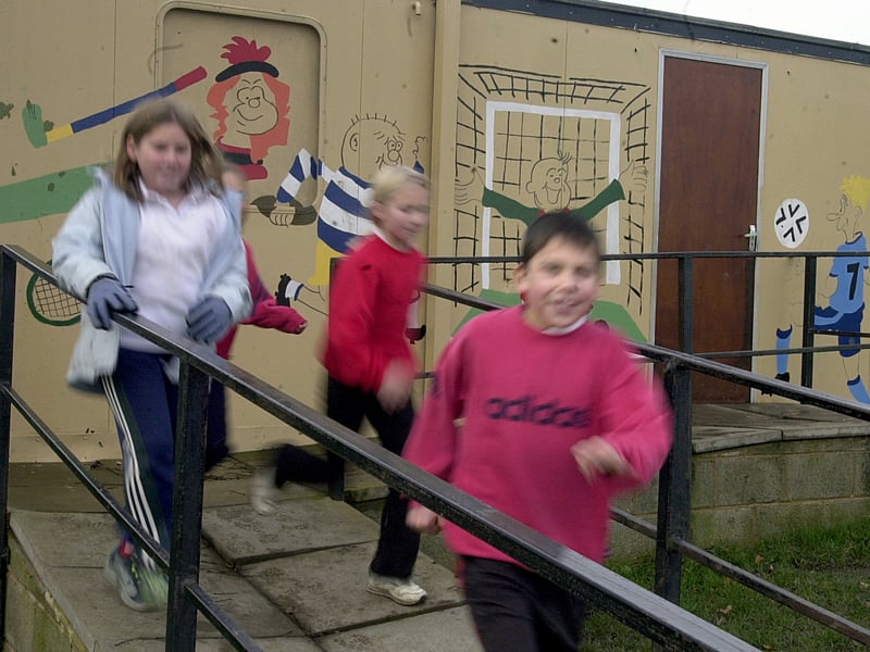 November 2000 and pupils from Birchfield Primary School enjoy using their newly painted playground.