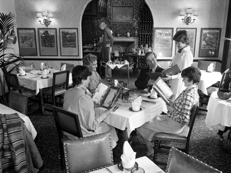 A waitress takes customers' orders in the Beehive Inn in the Grassmarket Edinburgh 1979