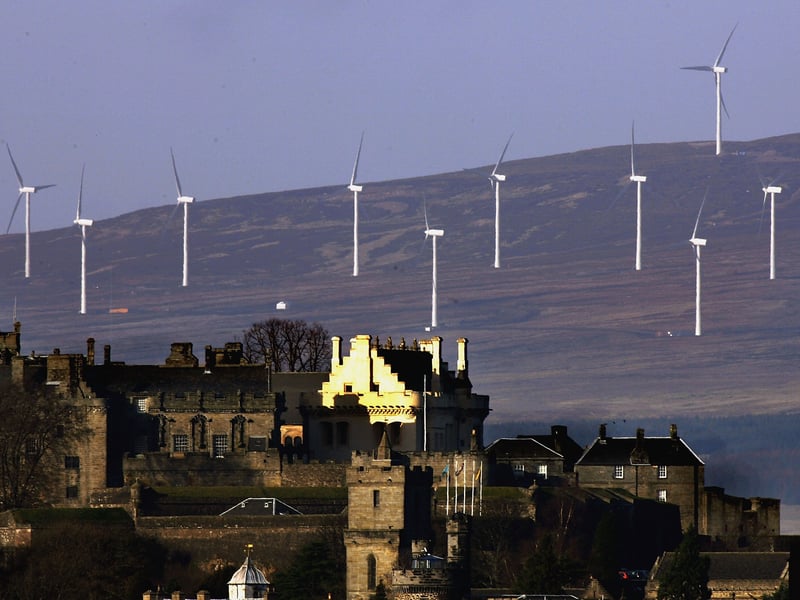 Wind turbines dominate the hillside behind Stirling Castle. The council area has ranked as the fifth best performing in Scotland, ranking highest on education (fourth overall) and finance (seventh overall)