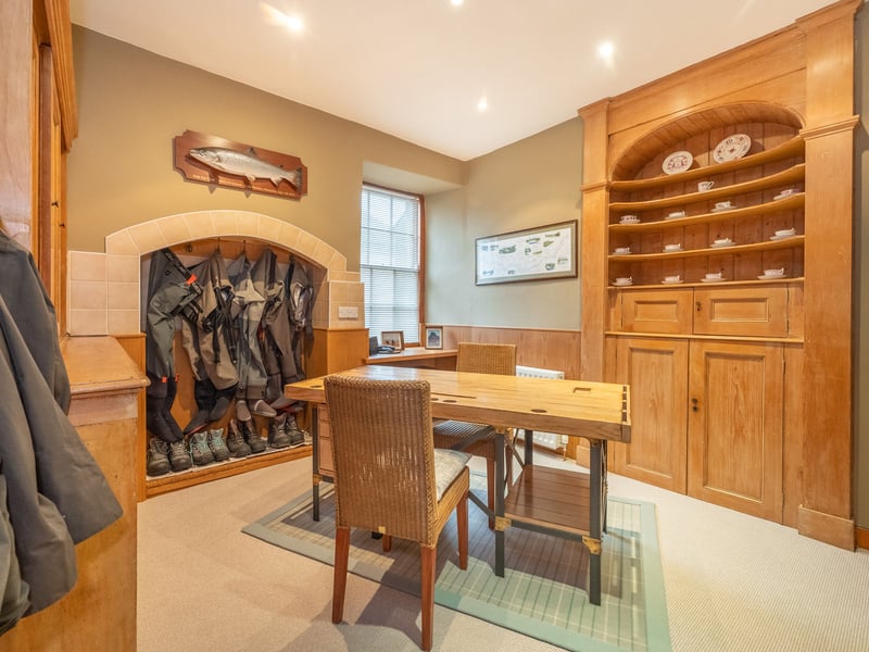 The boot room also stores fishing equipment.