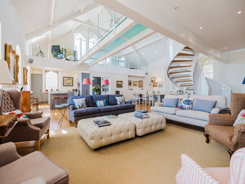 Ronald Graham bought the Old Church House in 2013 after falling in love with the house during the annual Pittenweem Arts Festival. He recalls: “The previous owner had completed the conversion and put in the mezzanine level with a walkway. When I saw it, I saw potential – it is such a beautiful space inside, right in the heart of the village, and with
elevated views over the harbour and the sea.”