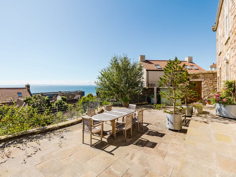 On the home’s lower-ground level are three double bedrooms, which open to the terrace with views of the Forth, plus three bathrooms.