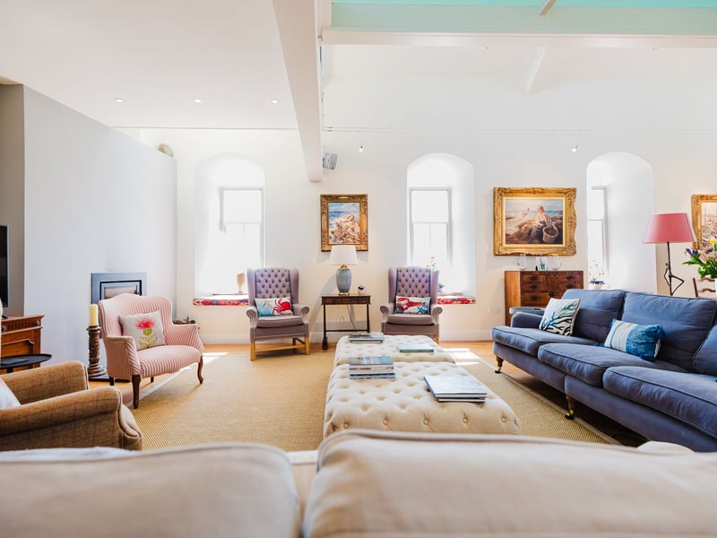 New bespoke windows were fitted 10 years ago and fill the interior with light.