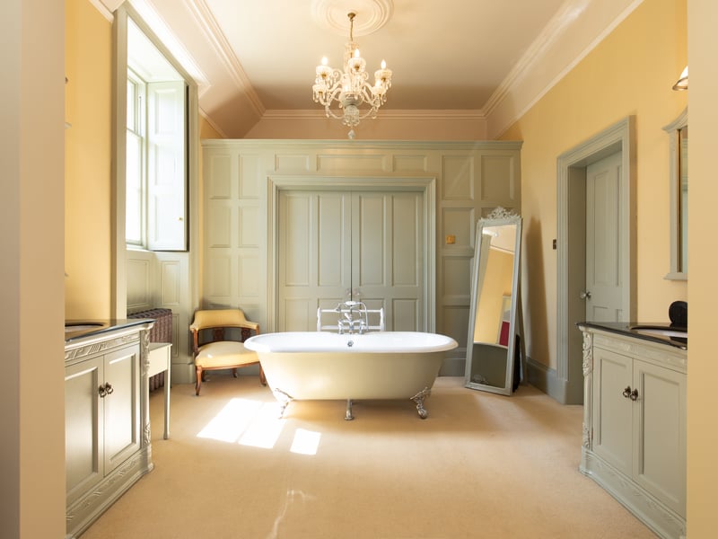 A sumptuous bathroom. Outside the house has a private drive, parking area and double oak-framed garage. The gardens are enclosed by a stone wall with terraced lawns, well-stocked flowerbeds and mature trees. Outside the drawing room is a paved terrace, and there are two summer houses.
Contact Knight Frank.