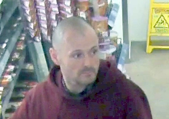 Photo LD8542 refers to a theft from a shop