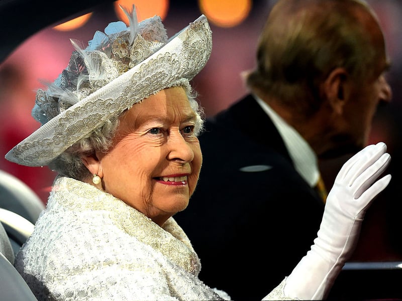 The Queen arrives at Celtic Park for the opening ceremony accompanied by the Duke of Edinburgh.