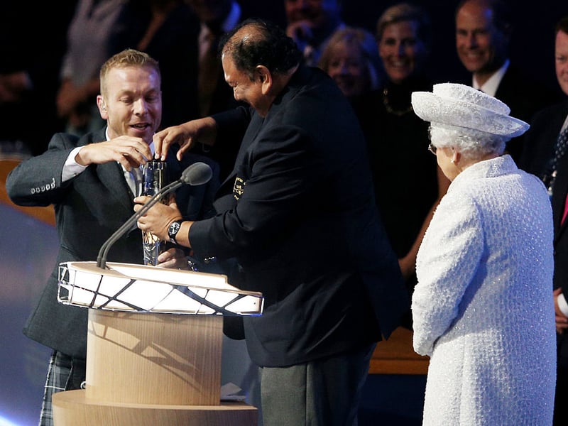 Sir Chris Hoy delivered the Queen's Baton after a round-the-world journey.