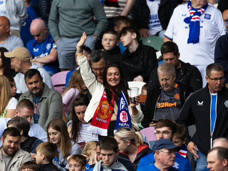 One Gers supporter smiles for the camera ahead of the game against Manchester United.