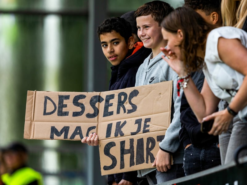Fans ask for the shirt of Rangers forward Cyriel Dessers.