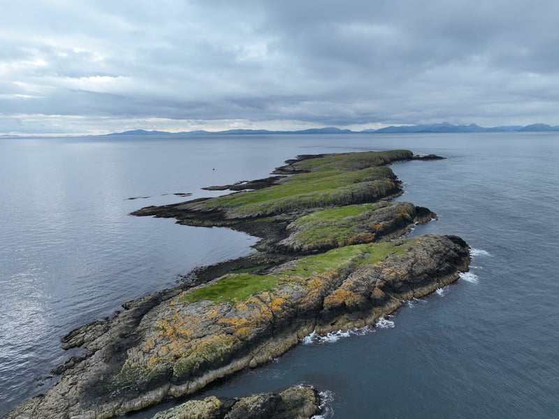 Fladda-Chuain translates as “Flat Island of the Ocean”, and is part of the Fladda Island Chain three miles northwest of Skye’s Trotternish peninsula. 