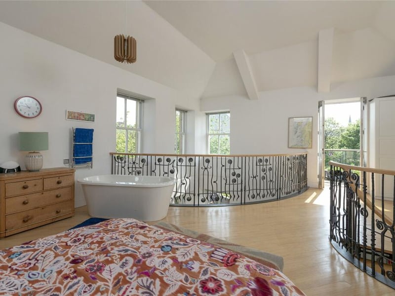 Double doors lead from the principal bedroom lead to a douth facing balcony.