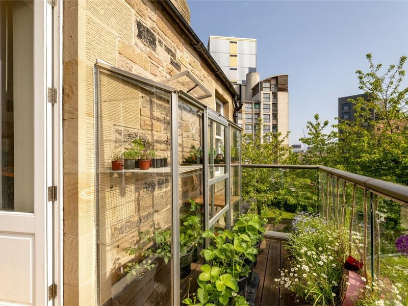 The balcony is glazed and accessed from the main bedroom.
