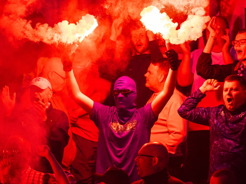The Rangers faithful set off pyro during a Trevor Francis Memorial match against Birmingham City.