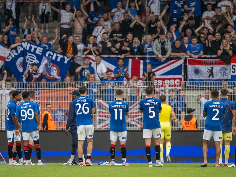 The Rangers team applaud the travelling fans in Berlin.