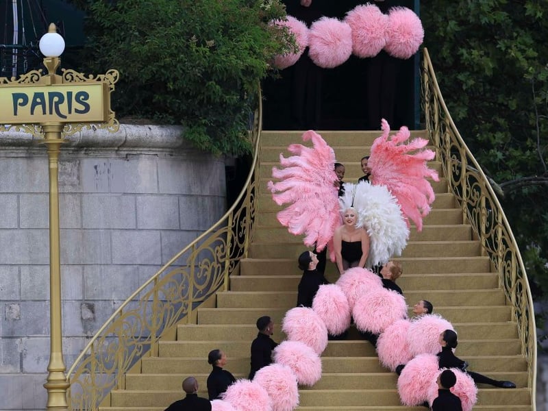 The inventive Opening Ceremony may have proved somewhat divisive but it certainly didn't lack in ambition. It had barely started when Lady Gaga popped out from behind pink pompoms and feathered fans to belt out 'Mon Truc en Plumes' ('My Thing With Feathers') on a golden staircase descending into the Seine - while rain poured down on the passing boats of drenched athletes celebrating their arrival. If you woke up the next morning and thought you'd dreamed it, then you wouldn't be alone.