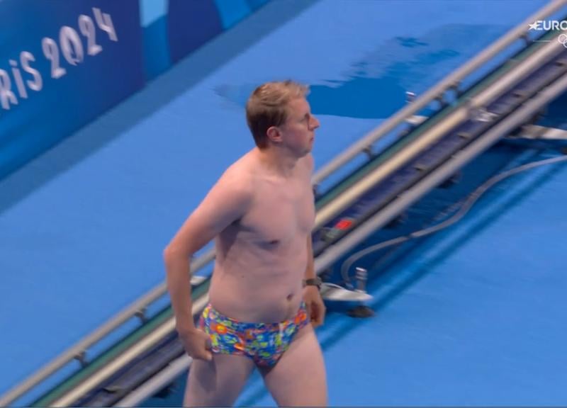 When the women's 100m breaststroke heats had to be halted due to an object spotted floating in the middle of the pool, an offical came to the rescue, stripping down to his trunks to dive in and retrieve what turned out to be a swimming cap. In an arena populated by perfectly-toned torsos, his 'dad bod' prompted wolf whistles and cheers. By the time he emerged from the pool he had earned an ovation from the crowd, waving his farewell after an unexpected moment in the spotlight.