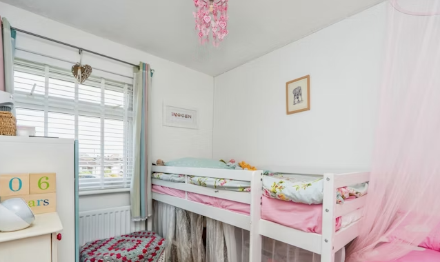 This home has a spacious back garden which would be ideal for a family. 