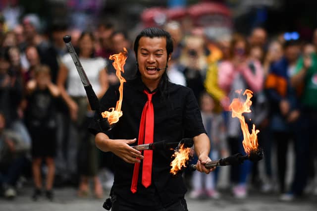 It doesn's cost a penny to watch the street entertainers on the Royal Mile in August - although they'd be grateful for a donation if you enjoy the performance.