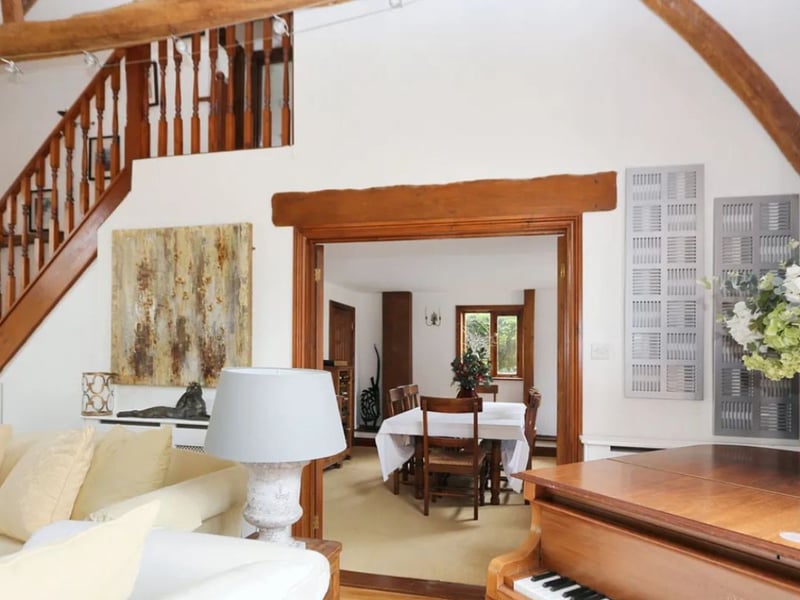 This beautiful home is a stunning barn conversion that also comes with a double garage and carport. 