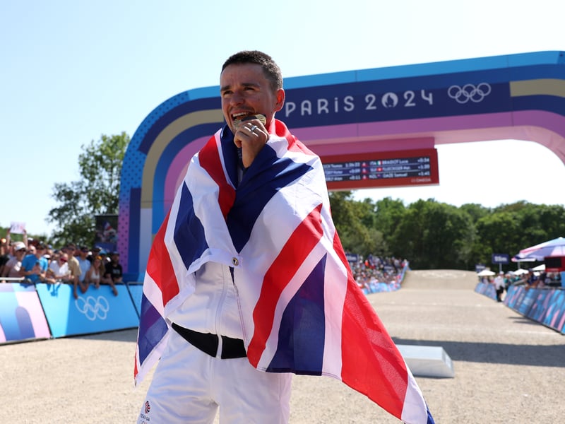 Not behind for long, here is Tom Pidcock pictured with his gold medal at the Paris Olympics 2024.