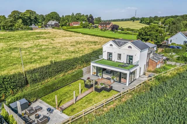 The listing says: "Nestled within the South Downs National Park with 360 degree panoramic views of the adjoining countryside, this breathtaking home is offered to the market for sale."