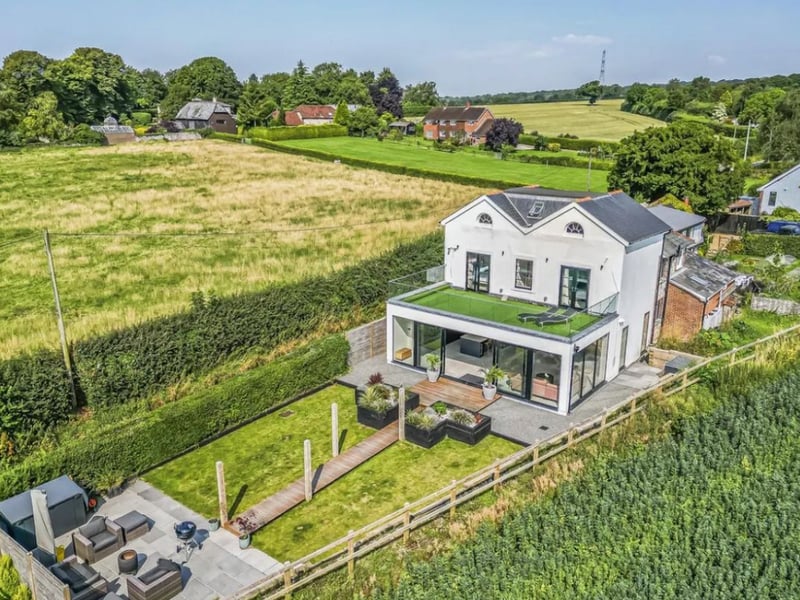 The listing says: "Nestled within the South Downs National Park with 360 degree panoramic views of the adjoining countryside, this breathtaking home is offered to the market for sale." 