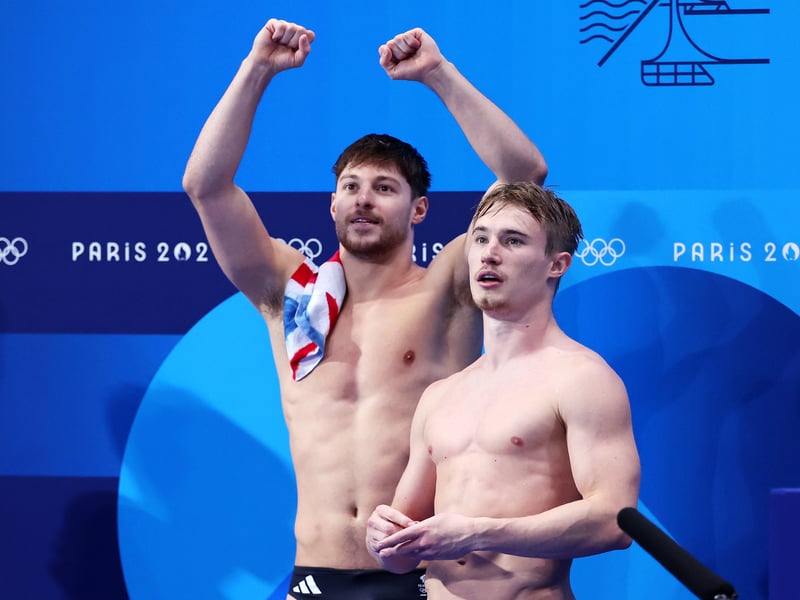 City of Leeds divers Anthony Harding and Jack Laugher of Team GB reacting after competing in the men's synchronised 3m springboard final (August 2).