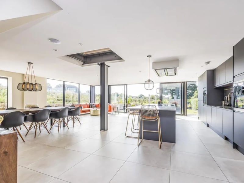The listing says: "This property, reminiscent of the iconic White House, is a local landmark cherished for its charm and unique character but that has been innovatively extended to create a home that wouldn't look out of place on 'Grand Designs'." 