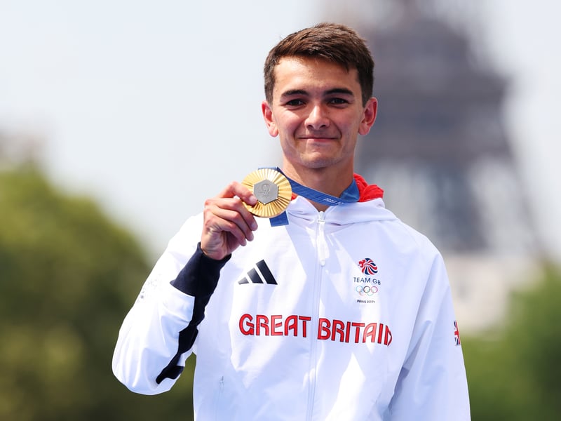 Pictured is the 26-year-old athlete with his gold medal.