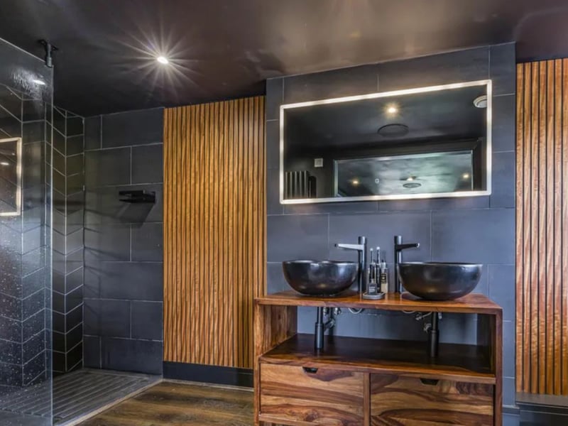 The listing says: "This property, reminiscent of the iconic White House, is a local landmark cherished for its charm and unique character but that has been innovatively extended to create a home that wouldn't look out of place on 'Grand Designs'." 