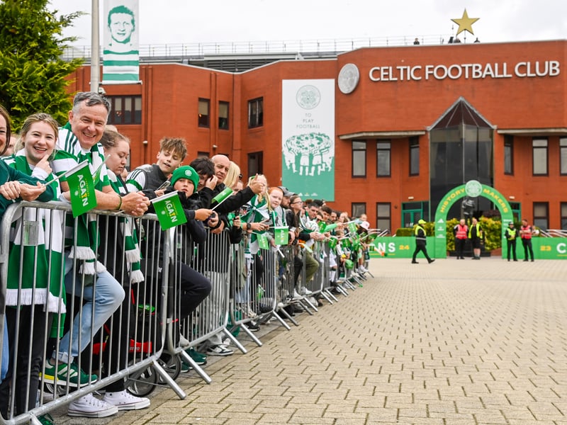 Hoops fans await the team arriving at Celtic Park.