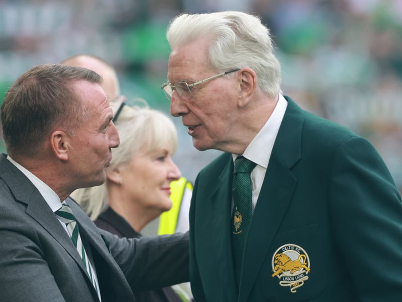 Celtic's Lisbon Lion, Jim Craig meets up with Brendan Rodgers after unfurling the flag.